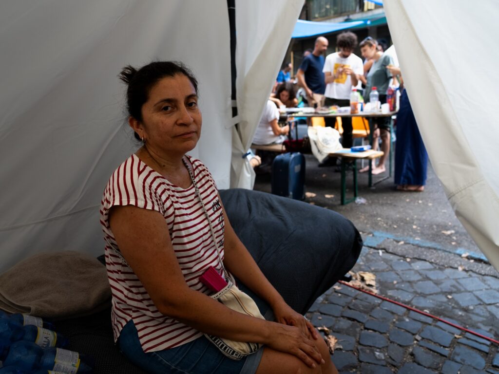 Hundreds camp on sweltering Rome street amid tussle over squatted building | Housing News