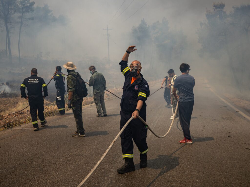 Firefighting helicopters collide near Athens as Greece battles wildfires | Weather News
