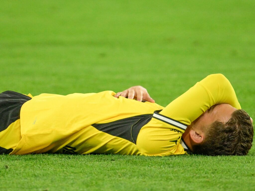Dortmund’s Karetsas hospitalised after collapsing in Champions League match | Football