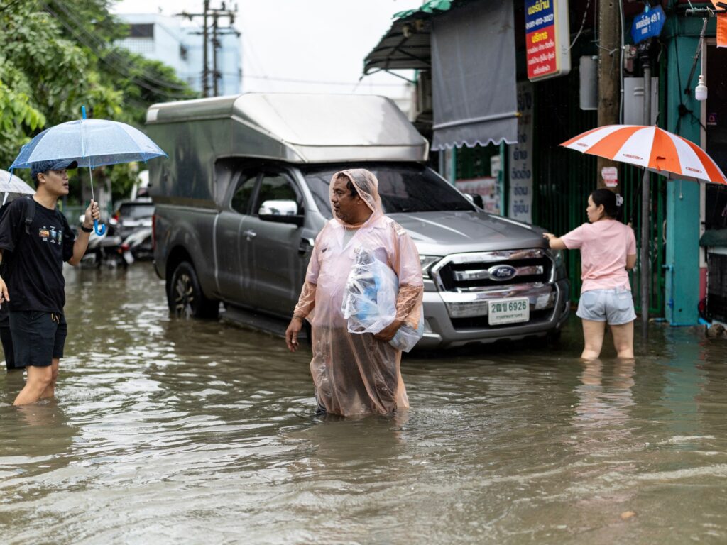 Photos: Heavy rains and flooding in Bangkok force thousands into shelters | Floods News